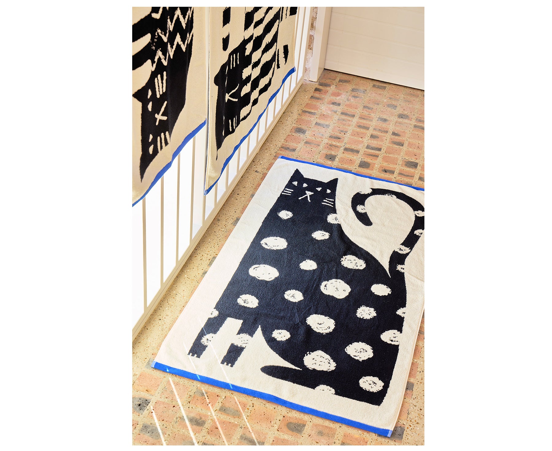 Lazy Cat Bath Towel by Donna Wilson