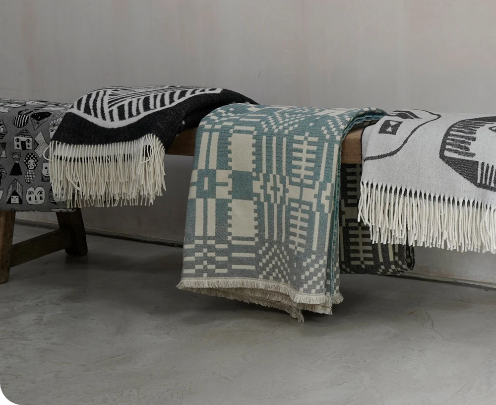 Here Comes the Rain Throw by Donna Wilson