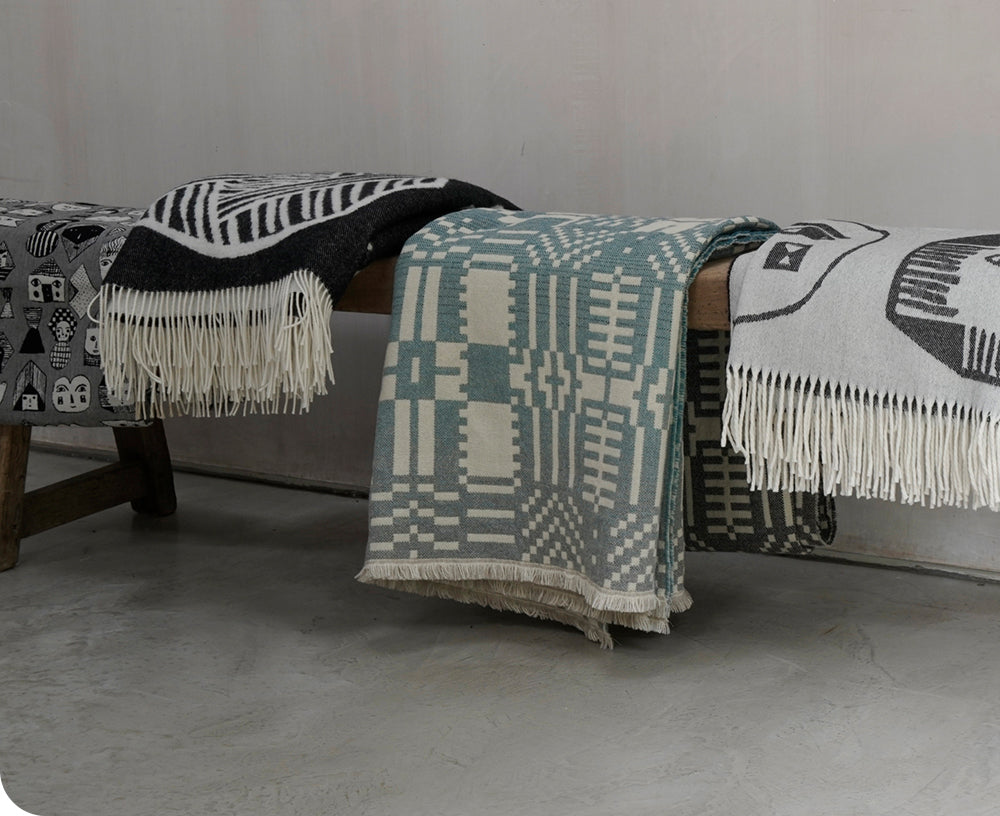 Here Comes the Rain Throw by Donna Wilson